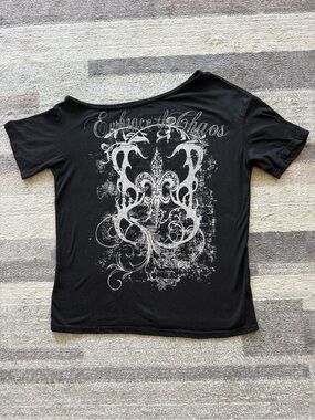 Black Off Shoulder Graphic Tee with 'Embrace the Chaos' Script